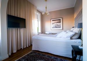 Letto o letti in una camera di Grand Hotel Jonkoping, BW Signature Collection