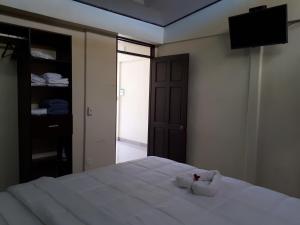 Postel nebo postele na pokoji v ubytování Chalet San Juanillo