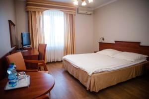 Posteľ alebo postele v izbe v ubytovaní Pokoje Amore Residence