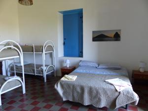 Krevet ili kreveti u jedinici u okviru objekta Il Vulcano a Piedi