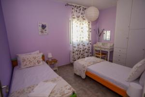 Postel nebo postele na pokoji v ubytování Rosie’s herb house + 24 fotografií
