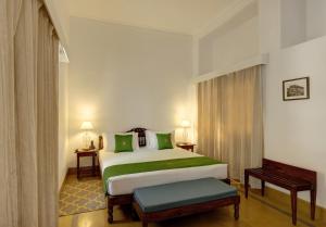 Saraca Hotel Lucknow客房内的一张或多张床位