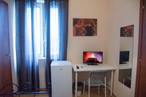 TV a/nebo společenská místnost v ubytování B&B Caffelletto - Papardo