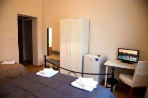 Postel nebo postele na pokoji v ubytování B&B Caffelletto - Papardo