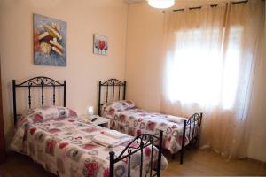 Postel nebo postele na pokoji v ubytování B&B Caffelletto - Papardo