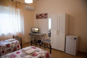 Postel nebo postele na pokoji v ubytování B&B Caffelletto - Papardo