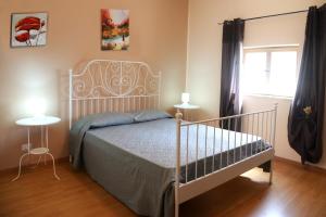 Postel nebo postele na pokoji v ubytování B&B Caffelletto - Papardo
