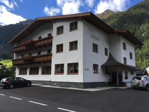 a building with a car parked in front of it at Haus Alpina in Kaunertal
