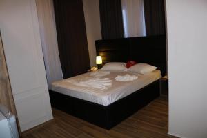 Katil atau katil-katil dalam bilik di Hotel Golden