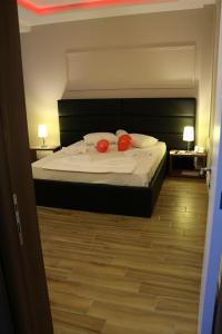 Katil atau katil-katil dalam bilik di Hotel Golden
