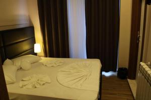Katil atau katil-katil dalam bilik di Hotel Golden