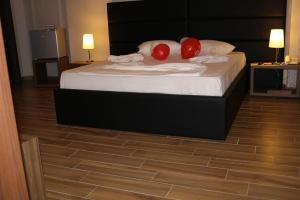 Katil atau katil-katil dalam bilik di Hotel Golden