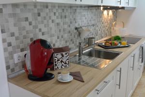 A kitchen or kitchenette at Apartamento El Pueblo