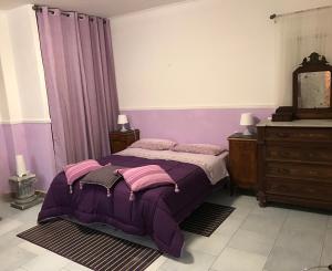 Posteľ alebo postele v izbe v ubytovaní Pied a terre sul porto