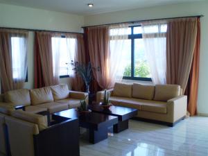 A seating area at Roubini Apartments