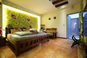 Katil atau katil-katil dalam bilik di Jasmine Orange B&B