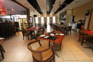 Ayr Traveller's Motel餐厅或其他用餐的地方
