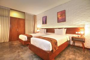 Кровать или кровати в номере Shankara Borobudur