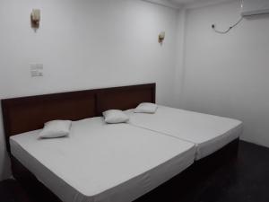 Postel nebo postele na pokoji v ubytování The Kingston Hotel