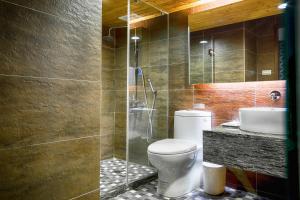 Koupelna v ubytování Cai She Hotel + 18 fotografií