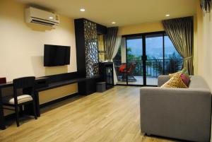 A seating area at Monsane River Kwai Resort & Spa