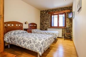 Postel nebo postele na pokoji v ubytování Cal Pascual