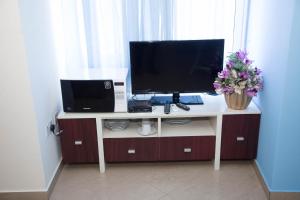 TV o dispositivi per l'intrattenimento presso Ridge Over Suite