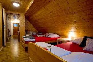 Sauna Cottage BedRichにあるベッド