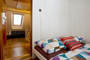 Postel nebo postele na pokoji v ubytování Sauna Cottage BedRich