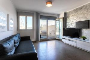 TV a/nebo společenská místnost v ubytování ApartUP Patacona Terrace Duplex I