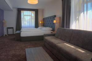 Postelja oz. postelje v sobi nastanitve Hotel Galatea
