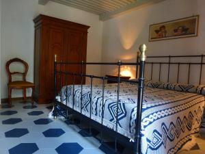 Un pat sau paturi într-o cameră la Villa Giove