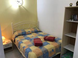Voodi või voodid majutusasutuse Cosy Studio toas