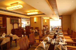 Restorāns vai citas vietas, kur ieturēt maltīti, naktsmītnē Hotel Karthika Park