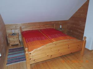 A bed or beds in a room at Egghartguthütte