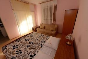 Ein Bett oder Betten in einem Zimmer der Unterkunft Apartment Kod Stipe