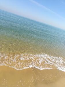 a view of the ocean from the beach at Palmera El Sokhna Chalets Families Only in Ain Sokhna
