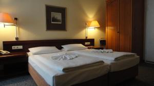 Postel nebo postele na pokoji v ubytování Hotel Xantener Eck