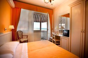 Postel nebo postele na pokoji v ubytování Hotel Hollywood
