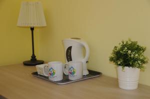 Coffee and tea making facilities at Color House Malpensa B&B