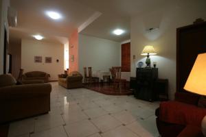 A seating area at Lena Hotel