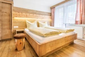 Postel nebo postele na pokoji v ubytování Pension Ahorn