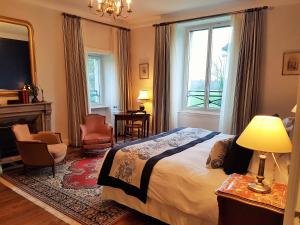 Letto o letti in una camera di Manoir de Kergrec'h