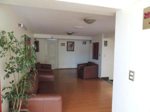 Posezení v ubytování Taypikala Hotel Cusco