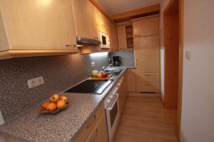 Kuchyňa alebo kuchynka v ubytovaní Appartements Stoffenhof