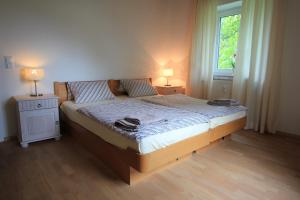 Ένα ή περισσότερα κρεβάτια σε δωμάτιο στο Haus Victoria