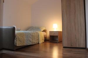 Postel nebo postele na pokoji v ubytování Apartments Anicic Coric
