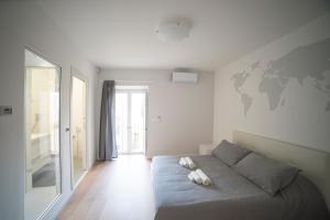 Postel nebo postele na pokoji v ubytování Suite Dreams