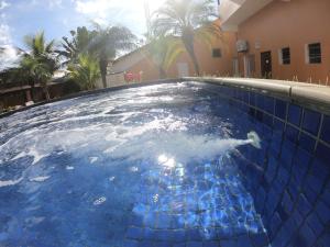 
A piscina localizada em Pousada Costa da Riviera ou nos arredores

