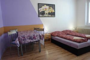 Postel nebo postele na pokoji v ubytování Apartment Tatranská Štrba